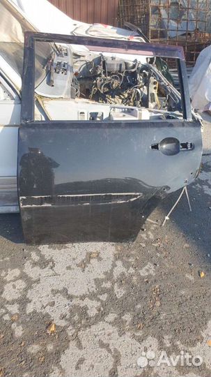 Паджеро спорт 2 задняя левая дверь