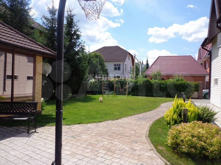 Коттедж 497 м² на участке 12 сот.