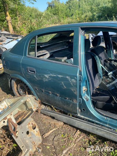 Дверь opel astra G