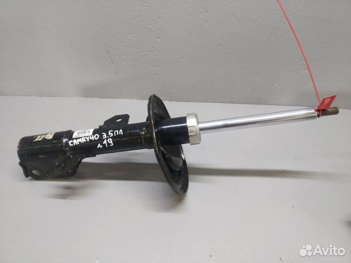 Амортизатор передний левый Toyota Camry V-40 3.5
