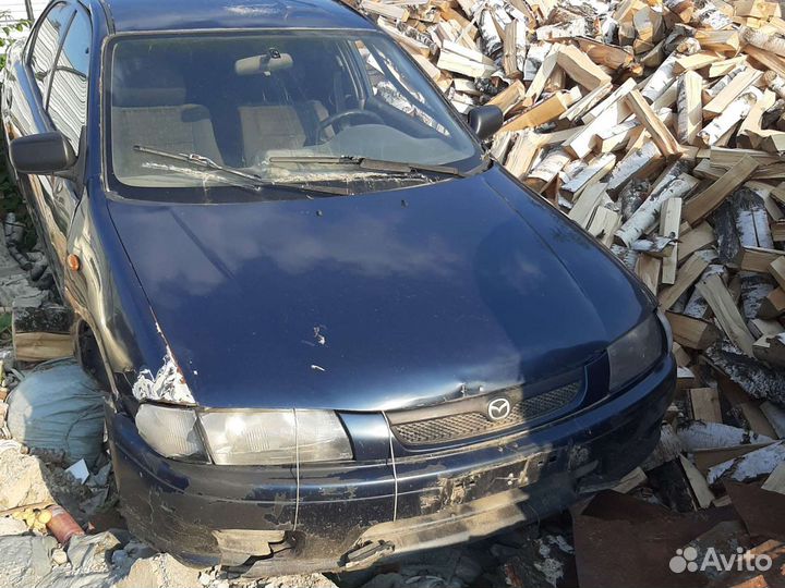 Капот mazda 323