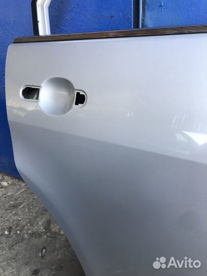 Задняя правая дверь Nissan Tiida 1