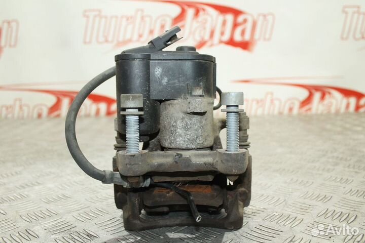 Суппорт задний левый Volkswagen Passat B6