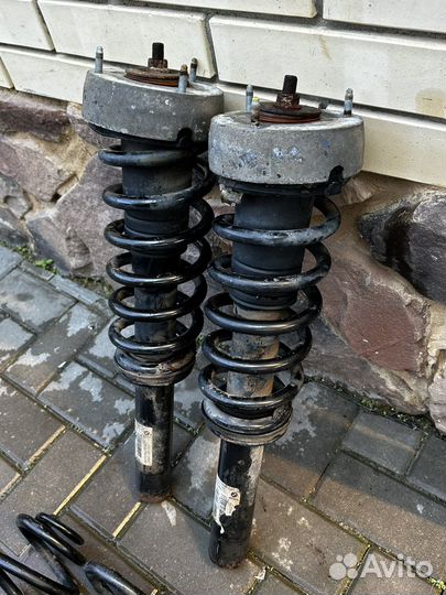 Стойки амортизаторов передние BMW E70