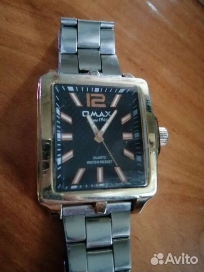 Часы кварцевые Omax