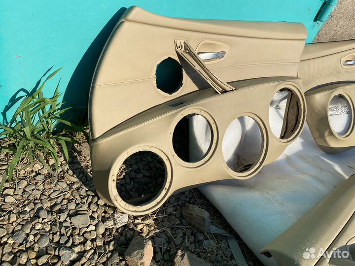 Обшивки дверей BMW E90