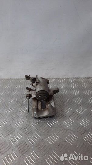 Суппорт тормозной задний левый Audi A3 хэтчбэк 5