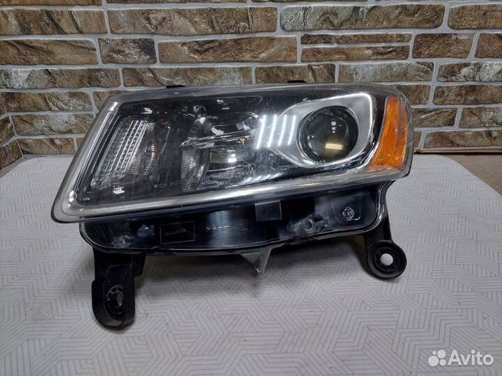 Фара левая Jeep Grand Cherokee