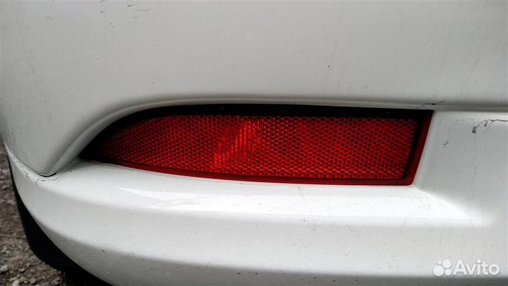 Отражатель в бампер задний левый Renault Logan 2