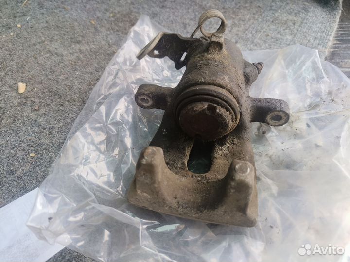 Тормозной суппорт astra h задний левый оригинал