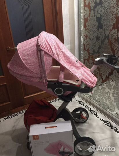 Коляска stokke