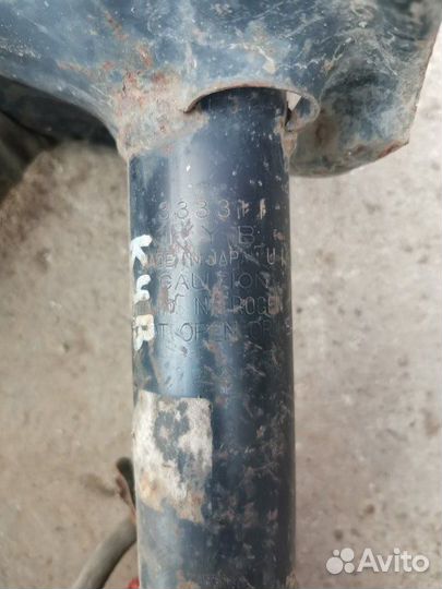 Амортизатор передний левый Nissan Almera N16