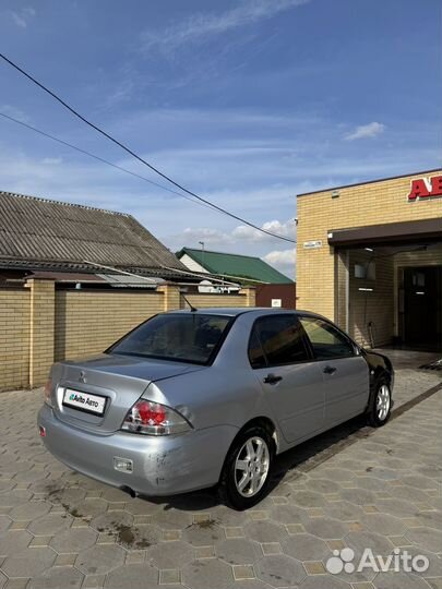 Mitsubishi Lancer 1.6 МТ, 2003, 124 525 км