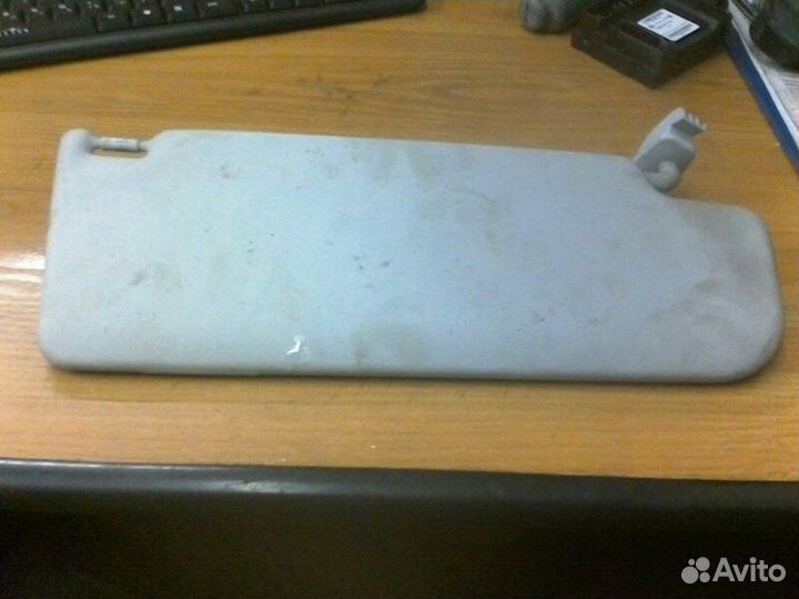 Козырек солнцезащитный передний левый Skoda