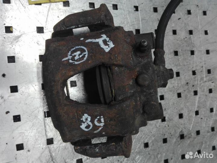 Суппорт передний правый Opel Astra F