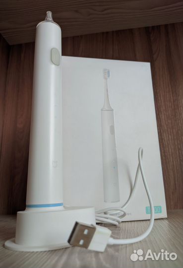 Электронная зубная щетка