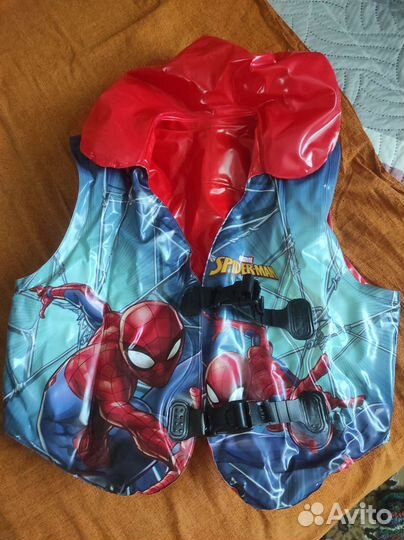 Жилет новый+нарукавники+тапочки