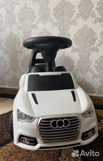 Машинка каталка полесье