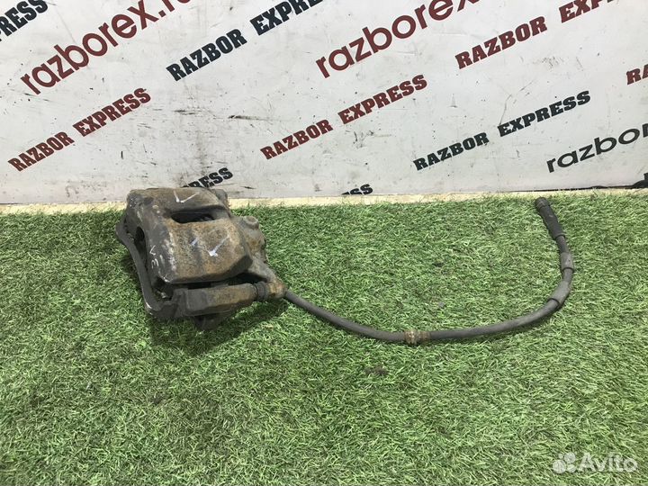 Суппорт тормозной передний левый Skoda Octavia A7