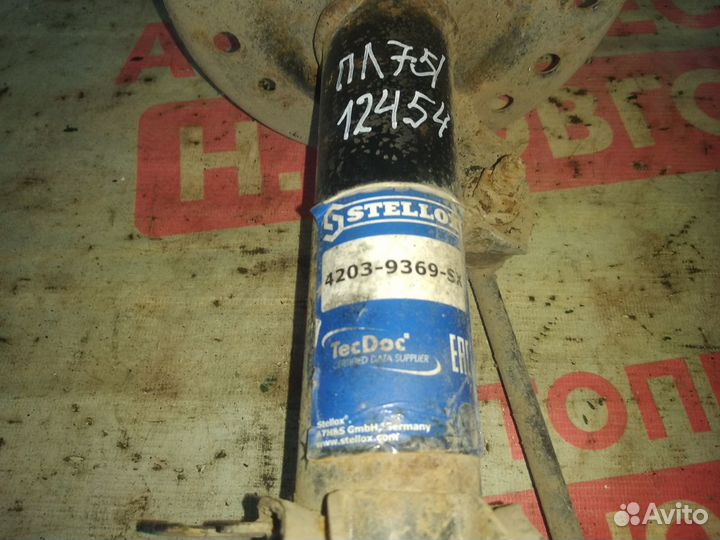 Стойка передняя левая Опель Корса