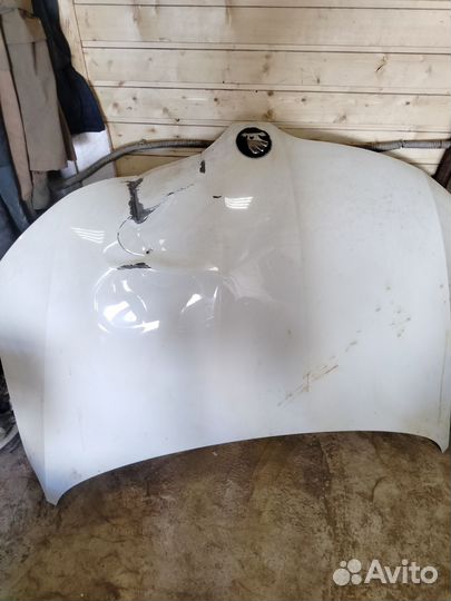 Капот skoda rapid 1