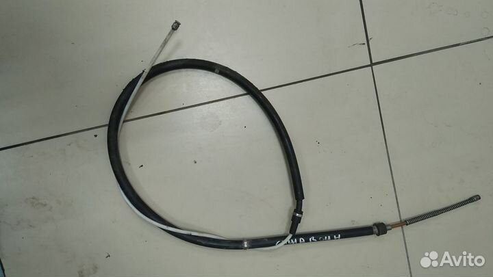 Трос стояночного тормоза Skoda Rapid