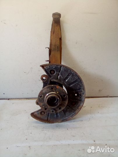 Кулак поворотный перед левый Volkswagen Touareg