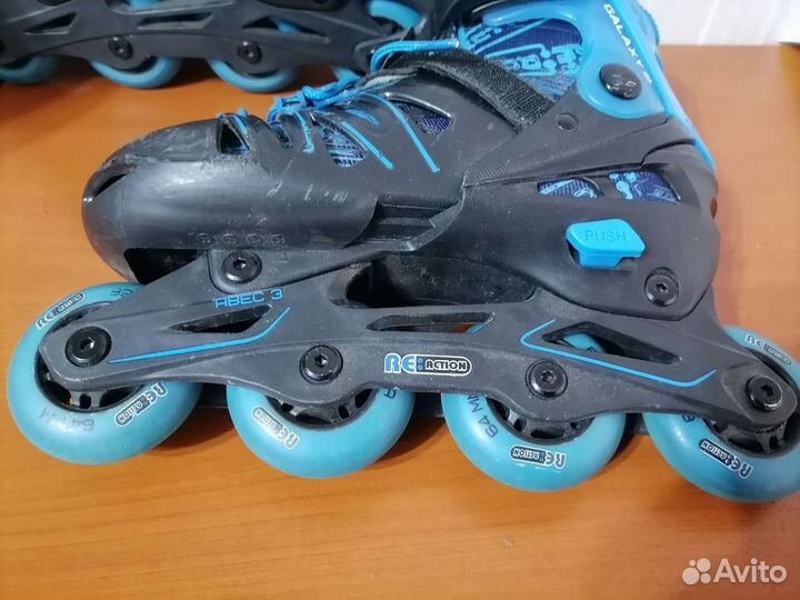 Роликовые коньки