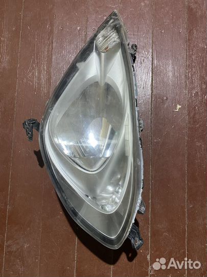 Фара левая передняя honda fit