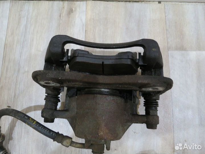 Суппорт тормозной передний правый Kia Rio 4