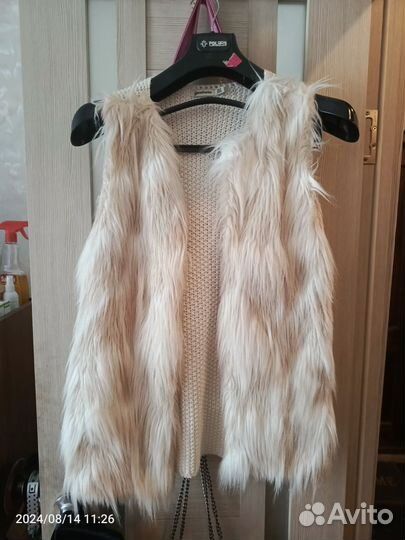 Жилетка меховая