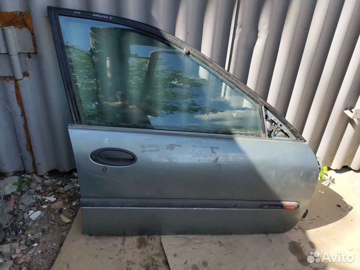 Дверь передния правая на Renault Laguna 1