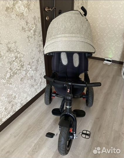 Трехколесный велосипед с ручкой