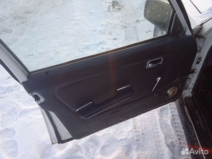 Дверная карта перед. левая Mercedes w123 мерседес