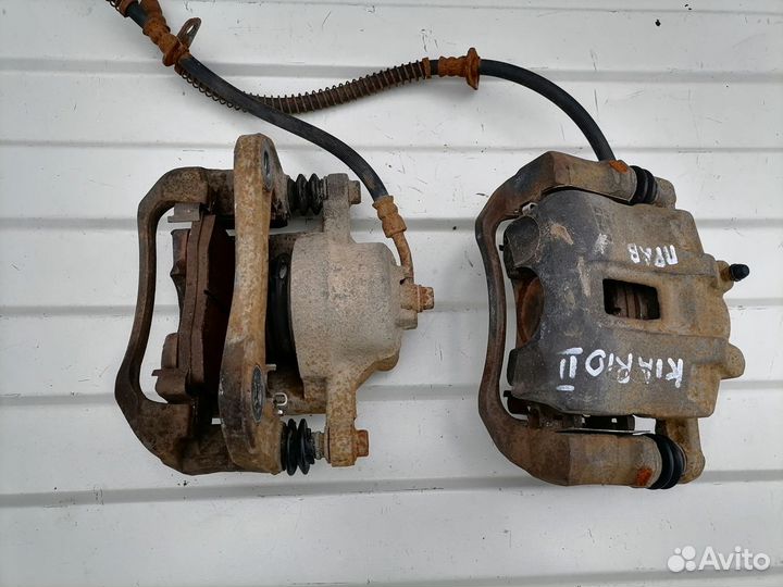 Суппорт передний левый, правый Kia Rio 2