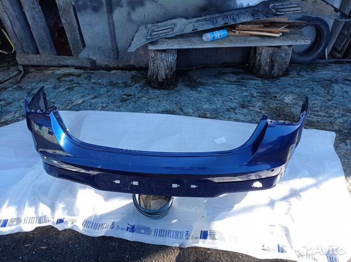 Бампер задний с юбкой KIA K5