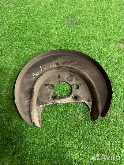 Пыльник тормозного диска левый Skoda Rapid/ VW Pol