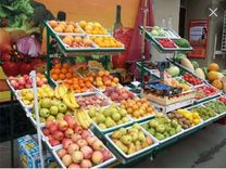 Продавец овощей и фруктов