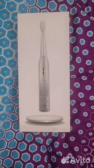 Электронная зубная щетка