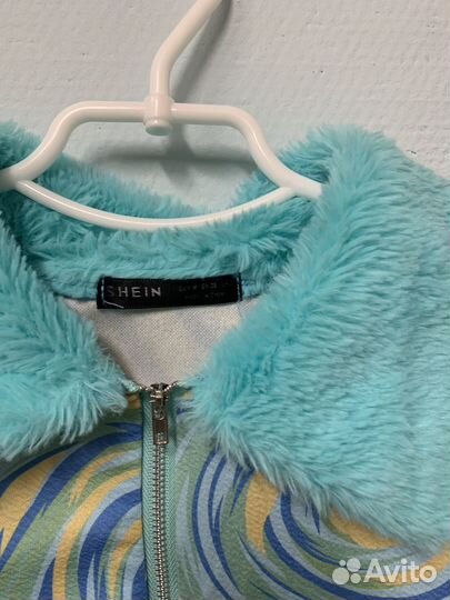 Необычный топ с искусивенными вставками