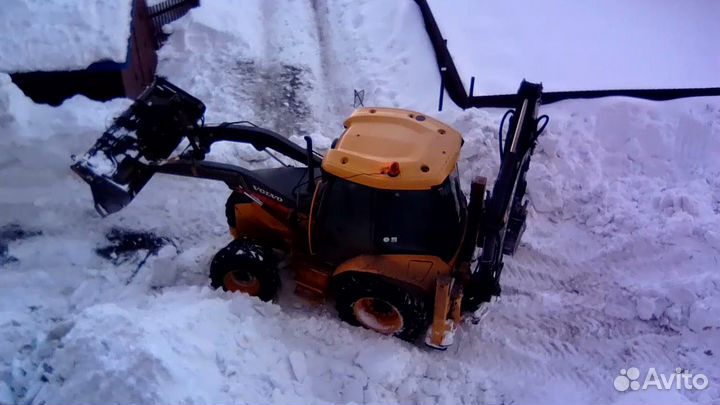 Услуги эксковатора погрузчика. Трактор