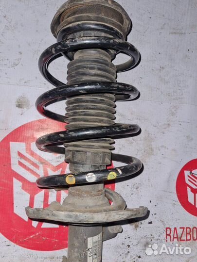 Стойка передняя в сборе левая Peugeot 208 хетчебек