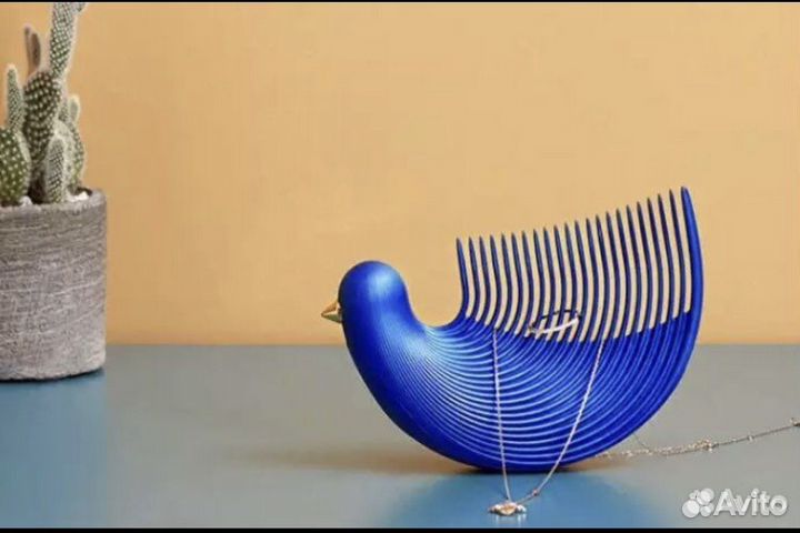 Гребень - птичка для массажа головы