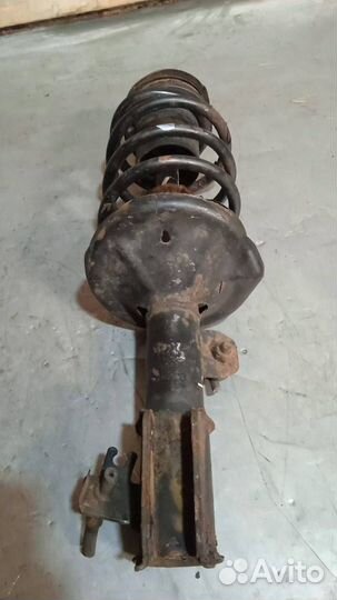 Стойка амортизатора передняя левая Chevrolet