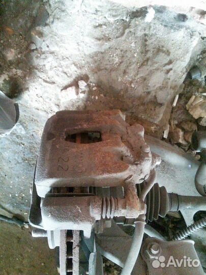 Суппорт передний левый Киа Рио 3