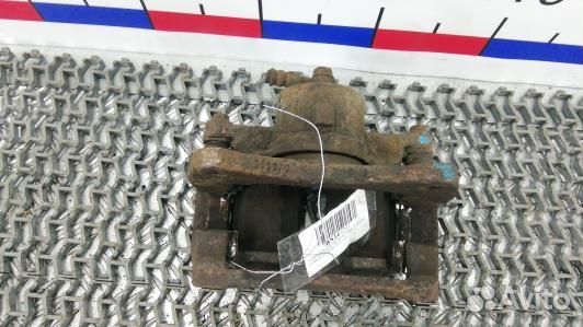 Суппорт тормозной передний правый toyota corolla E