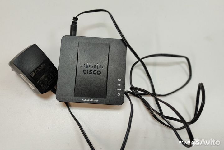 Адаптер для VoIP-телефонии Cisco SPA122