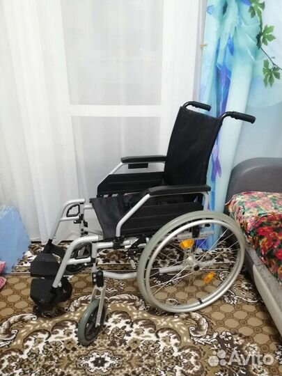 Инвалидная коляска новая