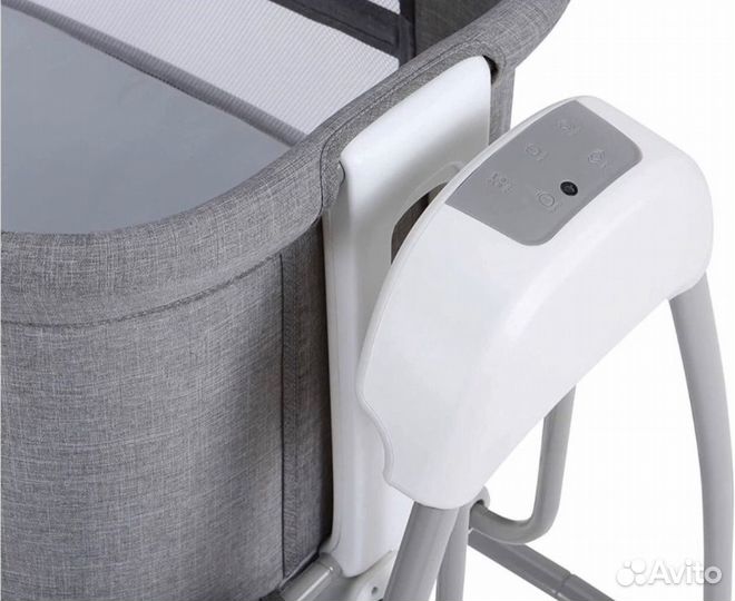 Детская кроватка с автоматическим маятником