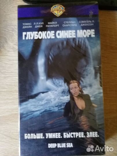 Видеокассеты с фильмами и мультфильмами